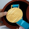 A gold medal for the Pyeongchang 2018 Winter Olympic Games during its unveiling ceremony in Seoul, South Korea, on Sept. 21, 2017