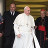Pope Francis leaves after the first session of an extraordinary consistory in the Synod hall at the Vatican City, Thursday, Feb. 20, 2014. 