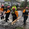 Search and Rescue workers from New York rescue a man in River Bend, North Carolina, Friday
