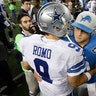 Dallas Cowboys quarterback Tony Romo and Detroit Lions quarterback Matthew Stafford greet after the game 