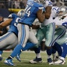 Detroit Lions defensive tackle Ndamukong Suh (90) sacks Dallas Cowboys quarterback Tony Romo (9) 