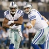 Dallas Cowboys quarterback Tony Romo (9) hands off the ball to running back DeMarco Murray (29) 