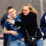 School_Shooting_Vertical_Photo_Hugging_Son