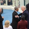 President-elect Donald Trump, left, shakes hands with President Barack Obama before the 58th Presidential Inauguration at the U.S. Capitol in Washington.