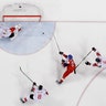 Martin Ruzicka of the Czech Republic shoots the puck past goalie Kevin Poulin of Canada