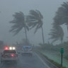 Palm trees bend in the wind as Hurricane Irma hits in San Juan, Puerto Rico, Wednesday