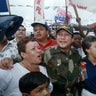 Gen. Manuel Antonio Noriega walks with supporters in the Chorrilo neighborhood on May 2, 1989.