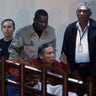 Panama's former strongman Manuel Noriega transported in a wheelchair inside El Renacer prison.