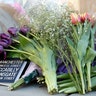 Floral tributes are laid out in Manchester, England, Tuesday May 23, 2017