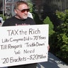 Suspect James T. Hodgkinson protests outside of the United States Post Office in Downtown Belleville, Ill., April 17, 2012