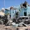 Somali security forces attend the scene of a car bomb attack in Mogadishu, Somalia 