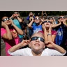 Fourth graders at Clardy Elementary School in Kansas City, Mo. practice the proper use of their eclipse glasses, August 18