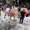 Residents line up to fill up sandbags in preparation of Hurricane Irma, in Frost Park in Dania Beach, Fla., Thursday