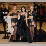 Dita Von Teese Posing with Lingerie Models