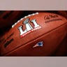 The New England Patriots' NFL Super Bowl LI game ball is finished with the team's logo affixed to it.
