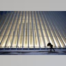 A man makes his way through wind and snow past the Oculus of the World Trade Center Transportation Hub, Thursday, Feb. 9, 2017, in New York. 