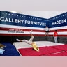 Displaced kids play while sheltering at Gallery Furniture, Wednesday, in Richmond, Texas