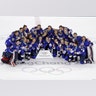 Untied States players celebrate with their gold medals after beating Canada in the women's ice hockey final at the 2018 Winter Olympics