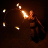 A participant dances with fire before the Man burn at the annual Burning Man arts and music festival in Nevada, September 2
