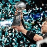 Philadelphia Eagles' Nick Foles celebrates with the Vince Lombardi Trophy after winning Super Bowl 52 in Minneapolis, Sunday