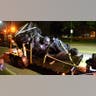 A monument dedicated to the Confederate Women of Maryland lies on a flatbed trailer early Wednesday, Aug  16, 2017
