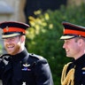 Prince Harry walks with his best man, Prince William the Duke of Cambridge, as they arrive for the the wedding ceremony