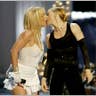 Shares an on-stage kiss with britney spears at the mtv video music awards, 2003