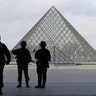 French police secure the site near the Louvre Pyramid in Paris, France, February 3, 2017.