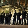 University of California at Berkeley police guard the building.