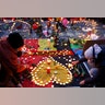 People gather around a memorial in Brussels, Belgium, March 22, 2016. 