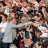 Britain's Prince William and Prince Harry greet crowds in Windsor, May 18, 2018