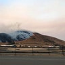 Wildfire burns behind the Sonoma Raceway, Oct. 9, 2017, in Sonoma
