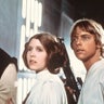 Harrison Ford as Han Solo, Carrie Fisher as Princess Leia Organa and Mark Hamill as Luke Skywalker in a scene from the 'Star Wars'