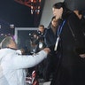 South Korean President Moon Jae-in shakes hands with Kim Yo Jong from North Korea at the Pyeongchang Winter Olympics