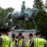 Virginia State Troopers stand under a statue of Robert E. Lee before a white supremacists rally in Charlottesville, Virginia, August 12  