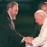 Former Cuban President Fidel Castro with former Pope John Paul II