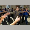 customer welcomed by apple employees