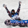 Gold medalist Shaun White (U.S.) makes history in the finish area in the men's halfpipe at the Vancouver 2010 Winter Olympics