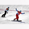 Gold medal winner Pierre Vaultier of France and bronze medal winner Regino Hernandez of Spain in the men's snowboard cross final