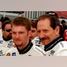 NASCAR drivers Dale Earnhardt (R) and his son, Dale Earnhardt Jr., pose for pictures February 3, 2001