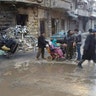 Civilians gathering for evacuation from eastern Aleppo, Syria, Thursday, Dec. 15, 2016, in this image released by the Thiqa News Agency. 