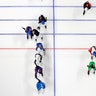 Speedskaters take positions during the women mass start final speedskating race