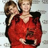 Actress Debbie Reynolds holds the Lifetime Achievement Award in Comedy for a Female which she received at the 11th annual American Comedy Awards in Los Angeles as she poses with her daughter Carrie Fisher. 