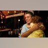 Anthony Bourdain holds his daughter Ariane in Miami Beach, Wednesday, Nov. 12, 2008