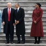 Former president Barack Obama (2nd R) and President Donald Trump share a laugh as former First Lady Michelle Obama (R) and Melania Trump look on following inauguration ceremonies swearing in Trump as the 45th president of the United  States.