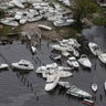 Boats are stacked up on each other in a marina in New Bern, North Carolina, Saturday  