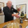 Craig Murray pouring Scotch tasting at Tobermory Distillery