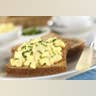 Simple egg salad on Melba toast crackers