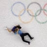 Madison Chock and Evan Bates of the United States fall during the ice dance, free dance figure skating final at the Winter Olympics