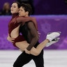 Tessa Virtue and Scott Moir of Canada perform during the ice dance, free dance figure skating final at the Winter Olympics